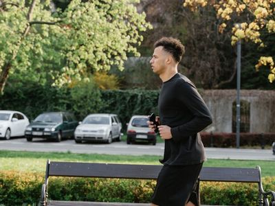 Athlete resting after morning run in the park