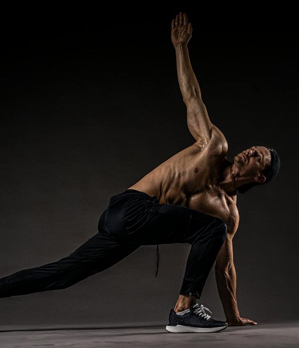 Person performing gentle stretching exercises after workout